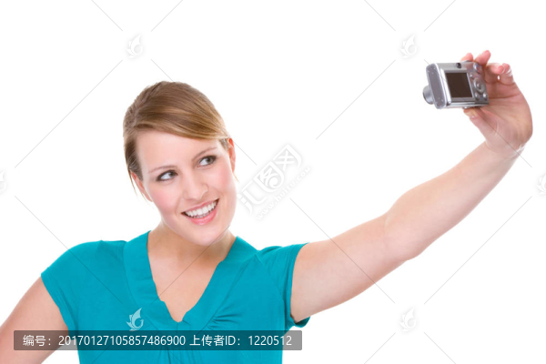帶數(shù)碼相機的女人
