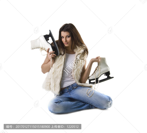 美麗的年輕女人和溜冰鞋