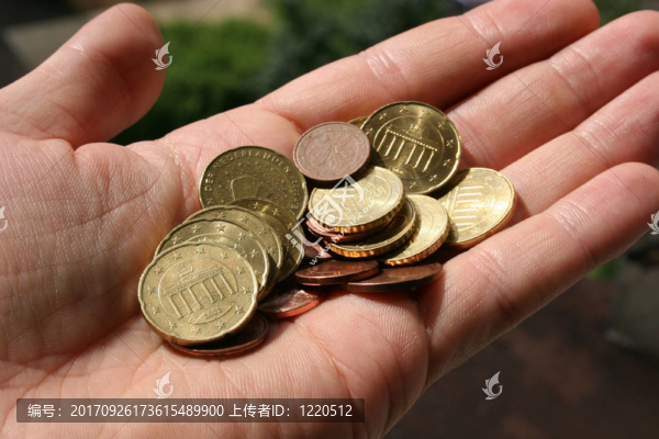 手上的硬幣、歐元硬幣
