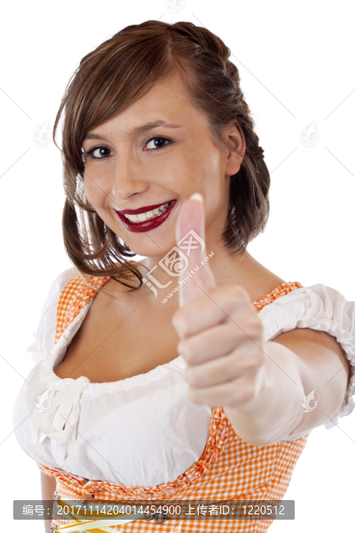 年輕，英俊，顯示豎起大拇指的少女裝的巴法力亞婦女