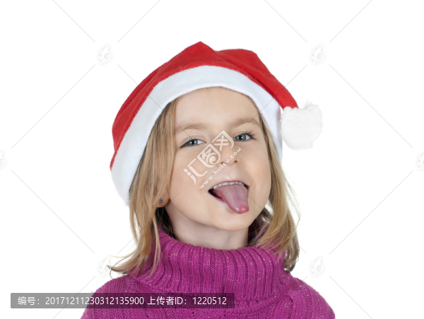 有圣誕老人帽子的小女孩伸出他的舌頭