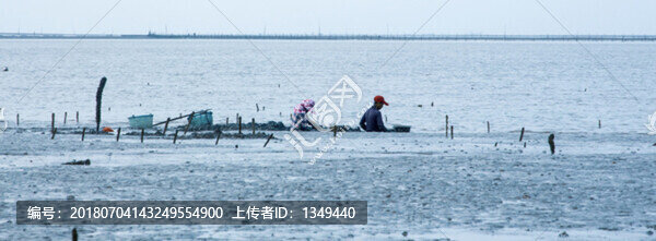 海邊捕撈者