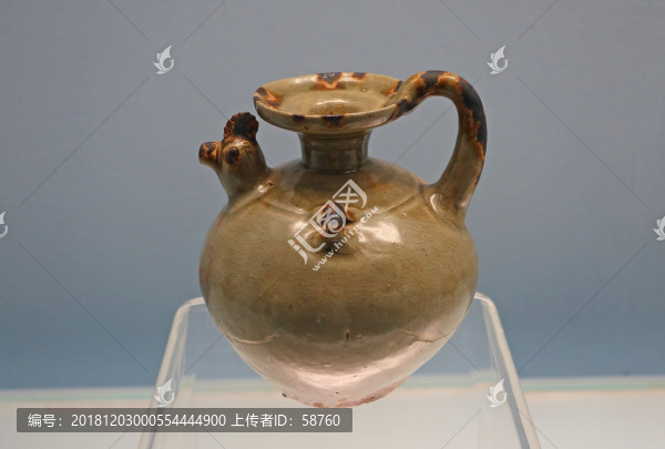 東晉青釉褐斑雞首壺