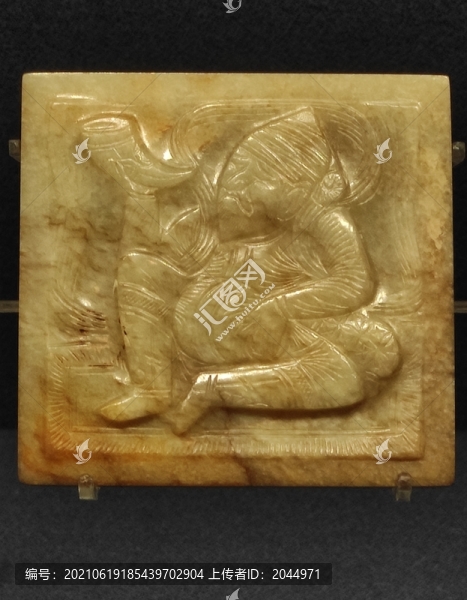唐代吹角擊鼓伎樂(lè)紋帶銙