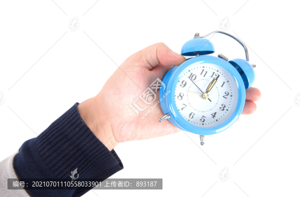 手里拿著鬧鐘