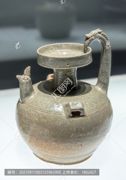 東晉水波紋龍柄雞首壺