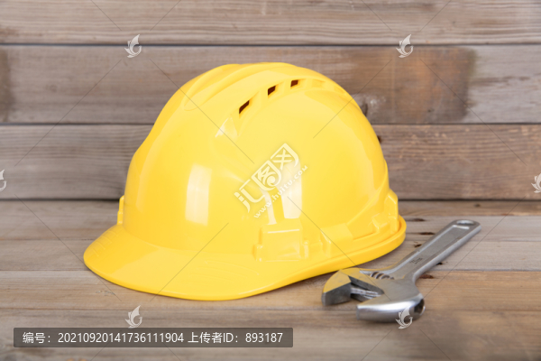 建筑行業(yè)的黃色安全帽和活口鉗子