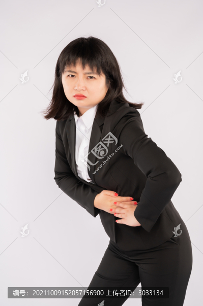 商業(yè)女性皺眉頭按壓肚子