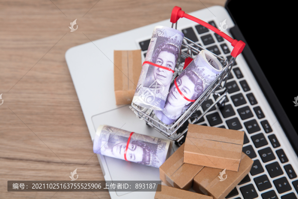 裝著英鎊鈔票的購物車和快遞包裹