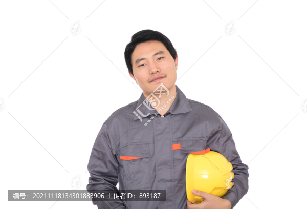建筑工人手抱黃色安全帽