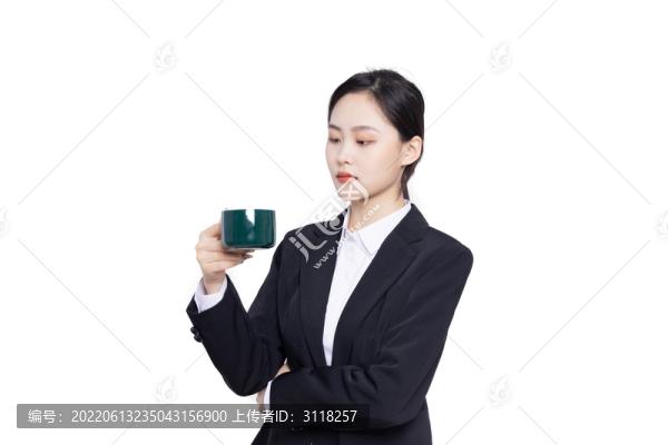 手持茶杯的美麗商務(wù)女性