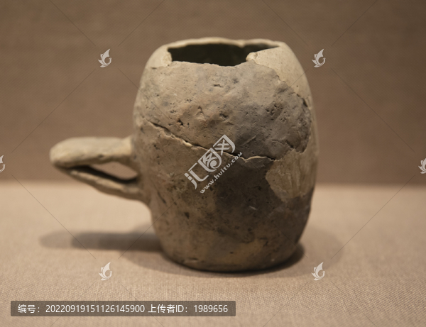 小口單把半底陶盉