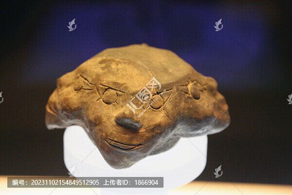 四面人頭形陶器蓋