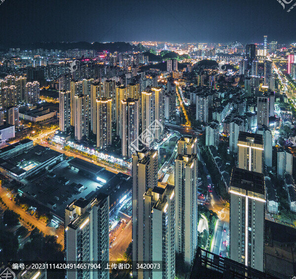 航拍廣西柳州夜晚的高層住宅樓