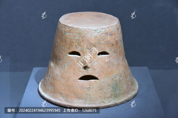 鏤空人面覆盆形器